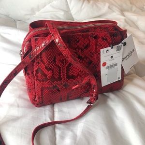 Red snake print bag